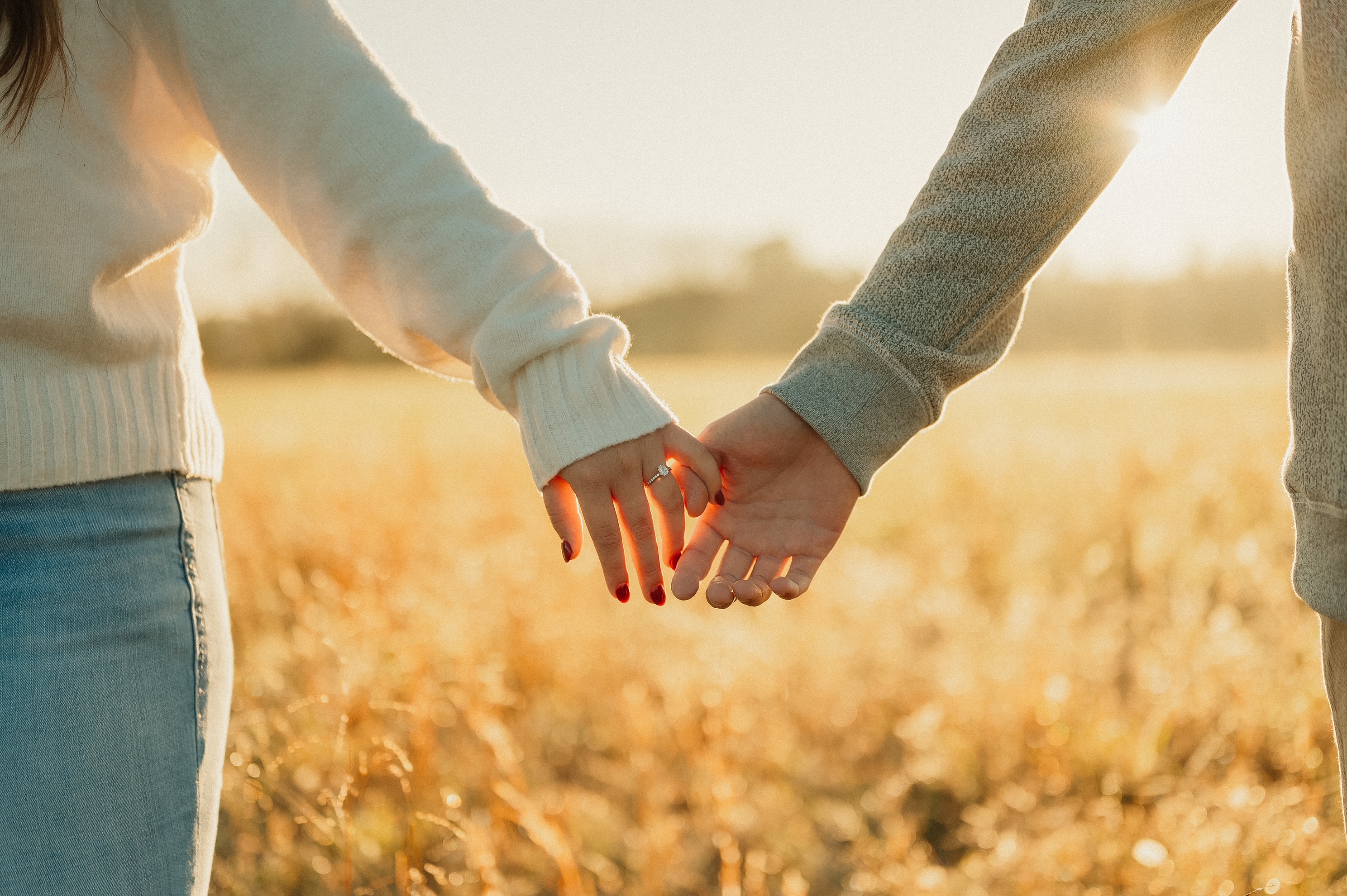 Kaileigh and Ryan holding hands